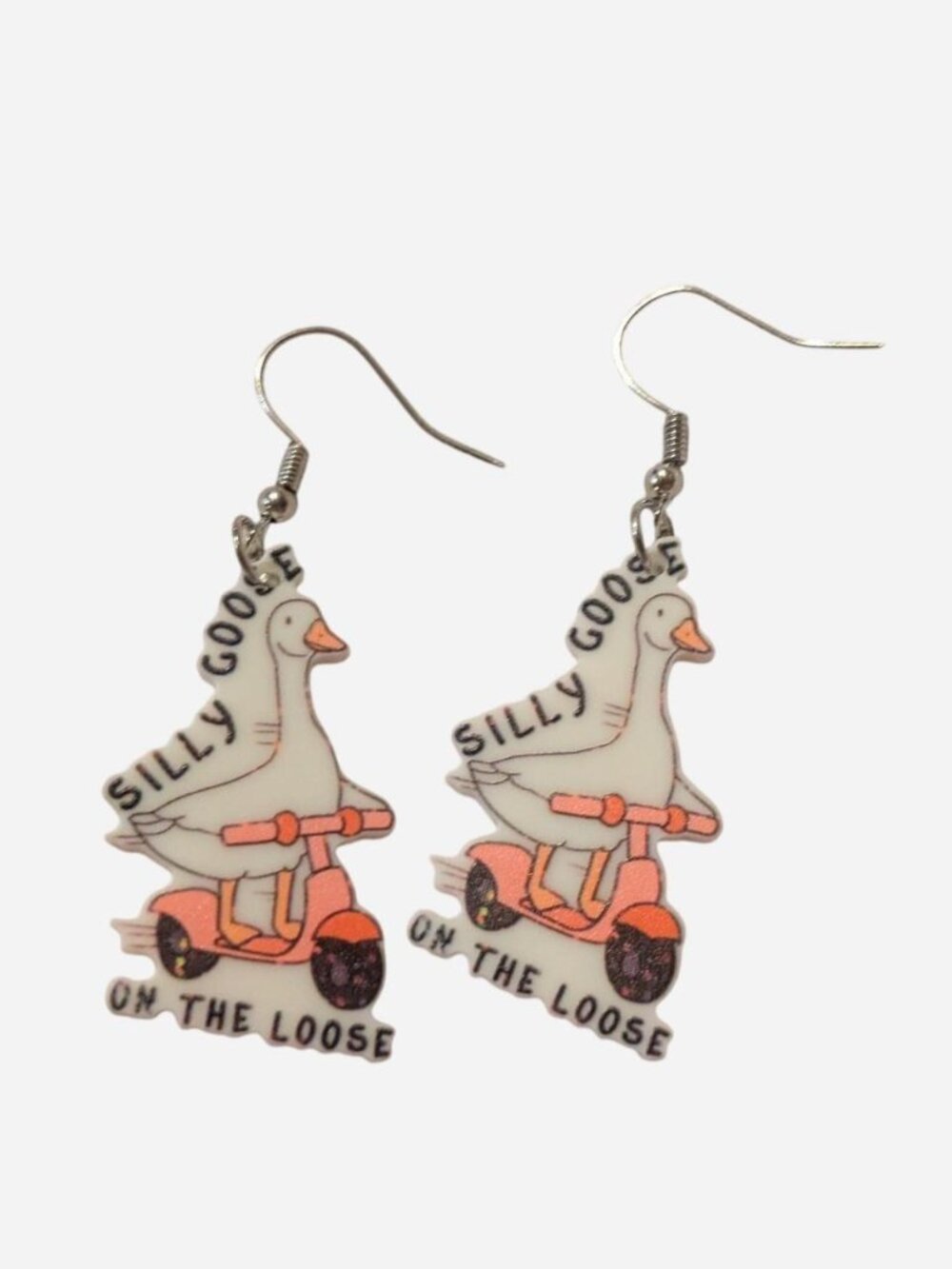 Silly Goose on the Loose earrings with white goose on an orange scooter